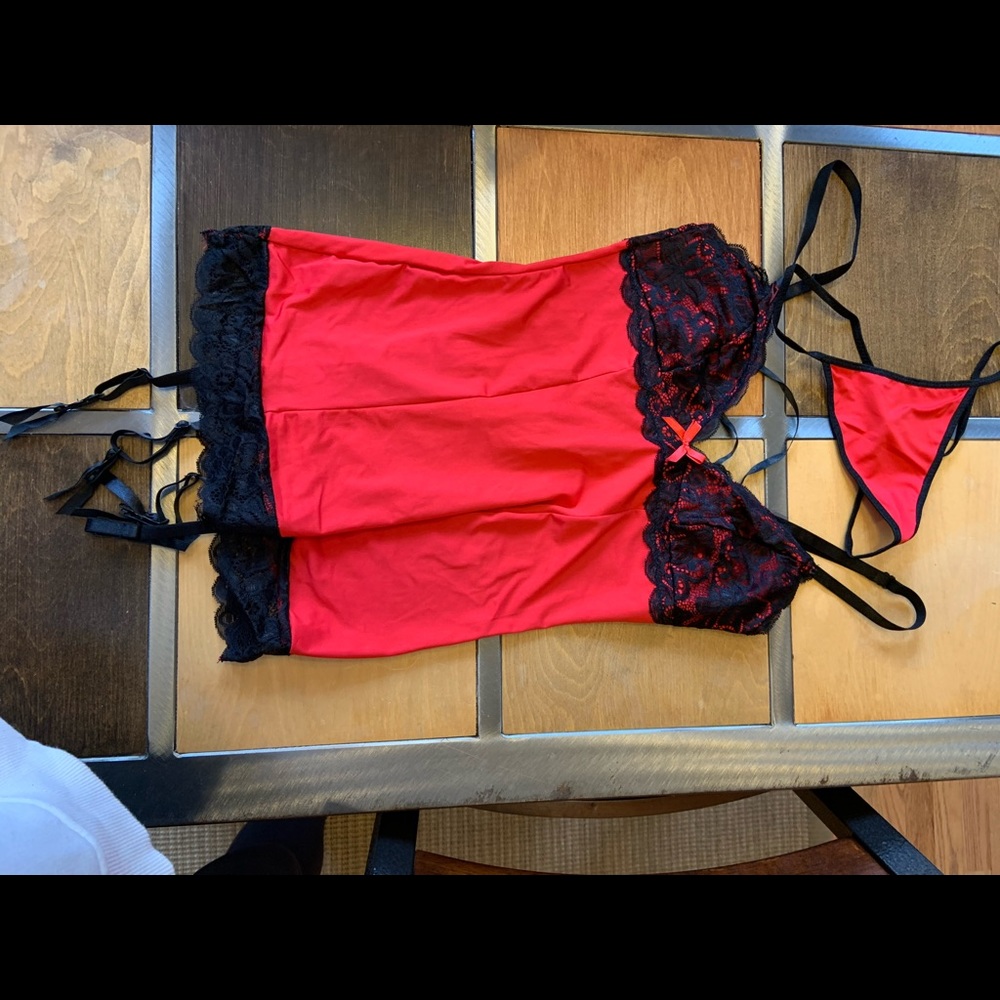 Two piece slip with removable garter. Size S. NWOT